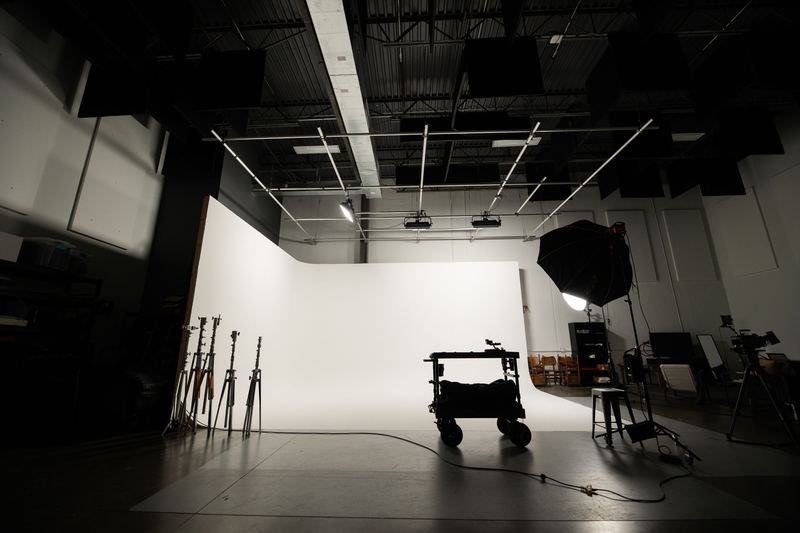 The Digital Spark studio in Charlotte, with its white cyc and lighting grid